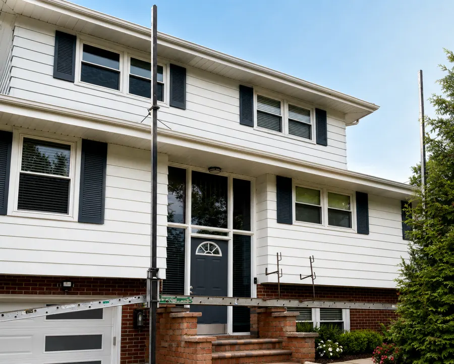 Local home before and after siding replacement before replacement